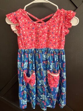Oopsie Daisy - Girls Coral & Navy Floral Pocket Dress with Crisscross Back